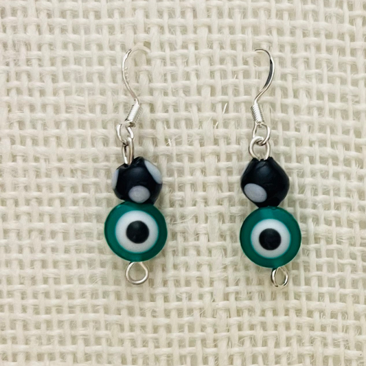 Green evil eye contadiojo earrings